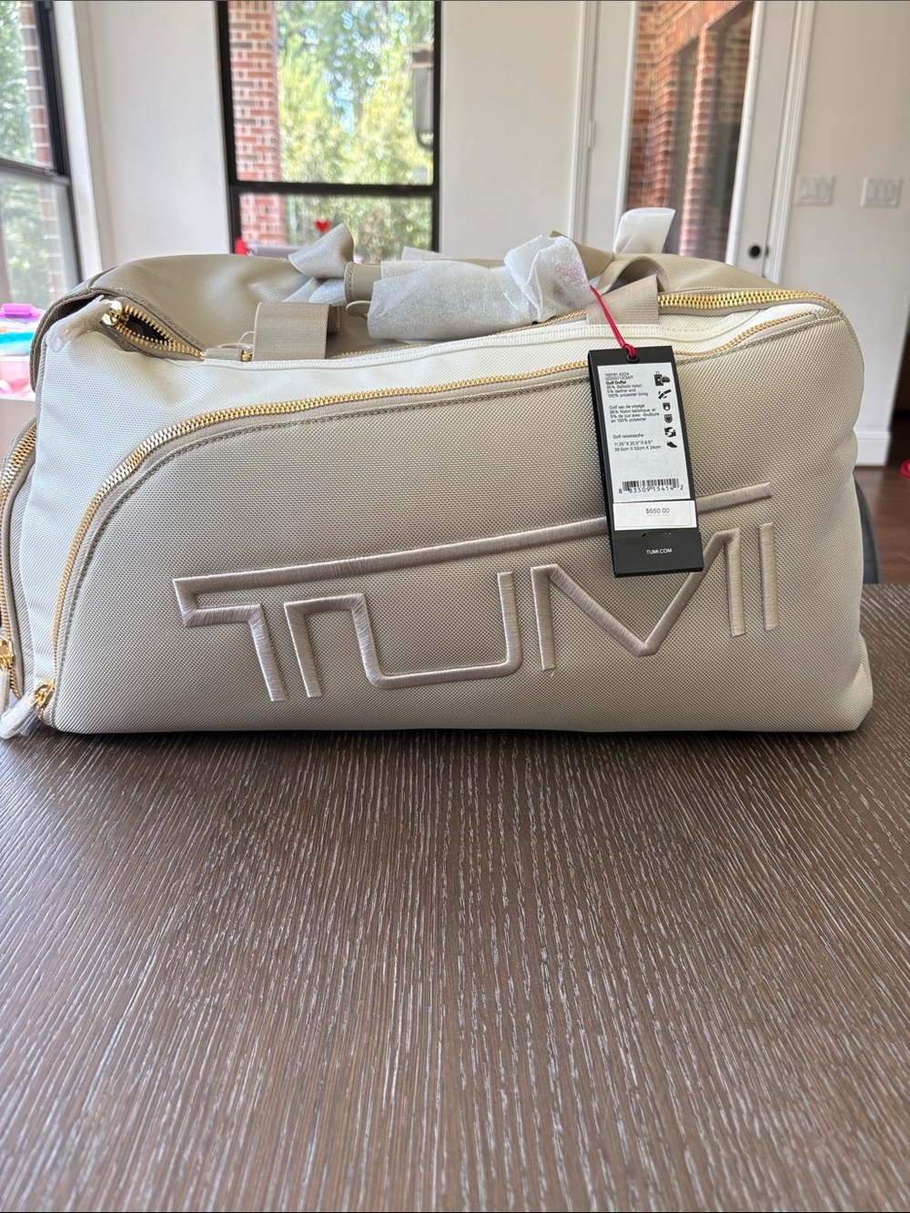 Tumi Beige Canvas Duffel with Gold Hardware